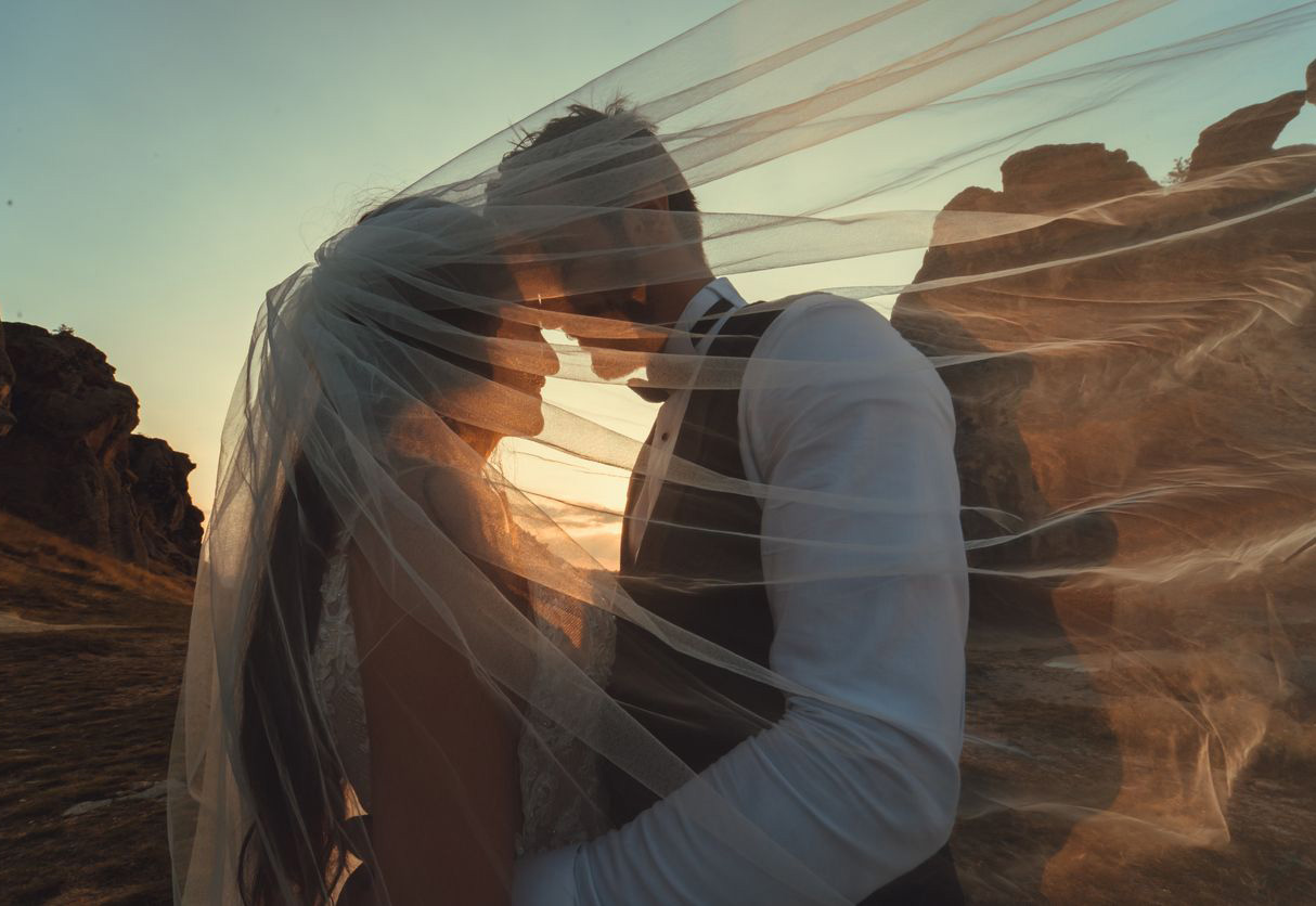 Bride and groom at their wedding, reveling in their love